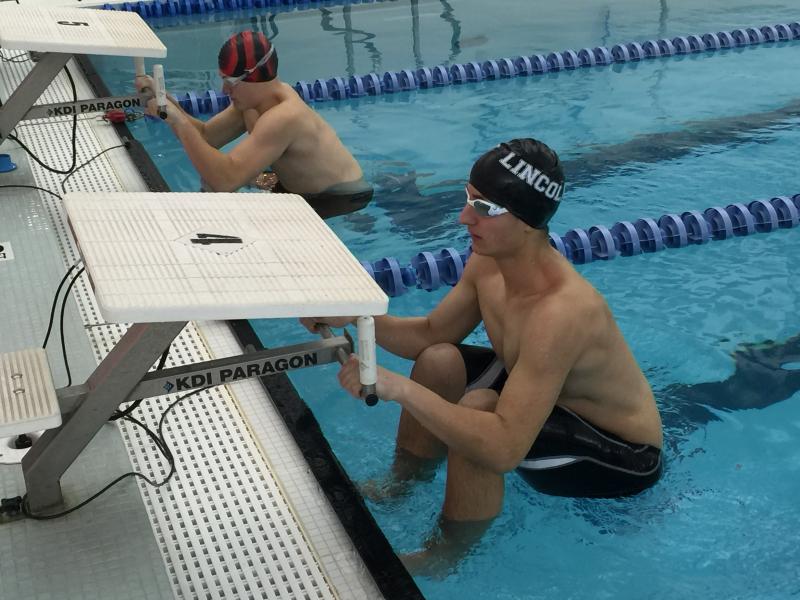 Eagle Tommy Thelander gets ready to battle Daren Wood of Wiscasset in the boys 100-yard backstroke event on Dec. 22. Thelander took first place with a state qualifying time of 1:12.41. KATRINA CLARK/Wiscasset Newspaper