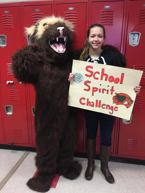 WMHS teacher Tricia Bursey in mascot costume and Keara Hunter fill the hallway with their school spirit. Courtesy of Deb PoolerA