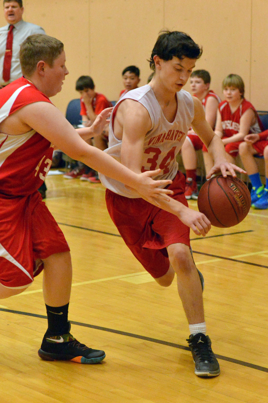 Action from the Busline small school championship between Wiscasset and Vinalhaven. After a close, hard fought battle Wiscasset was able to capture the 52-50 win. (Photo by Ron Hawkes)