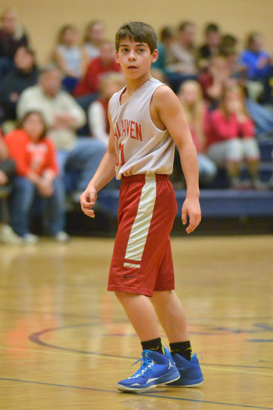Action from the Busline small school championship between Wiscasset and Vinalhaven. After a close, hard fought battle Wiscasset was able to capture the 52-50 win. (Photo by Ron Hawkes)