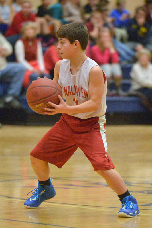 Action from the Busline small school championship between Wiscasset and Vinalhaven. After a close, hard fought battle Wiscasset was able to capture the 52-50 win. (Photo by Ron Hawkes)