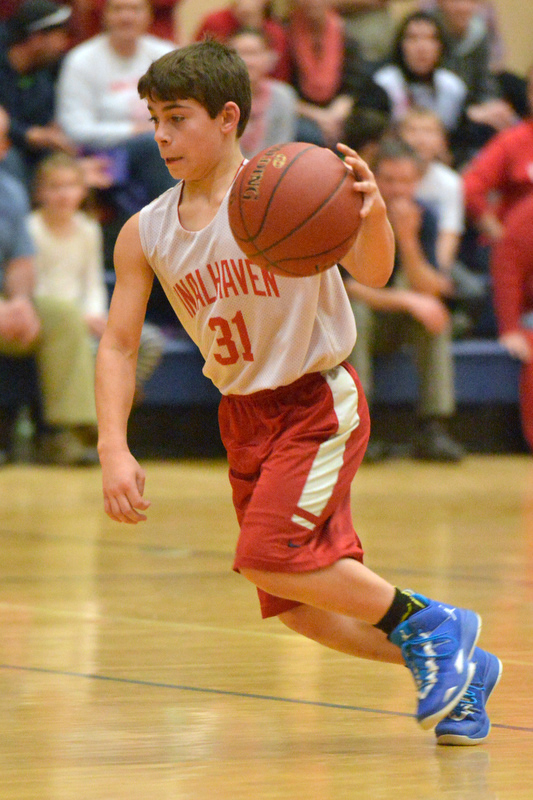 Action from the Busline small school championship between Wiscasset and Vinalhaven. After a close, hard fought battle Wiscasset was able to capture the 52-50 win. (Photo by Ron Hawkes)