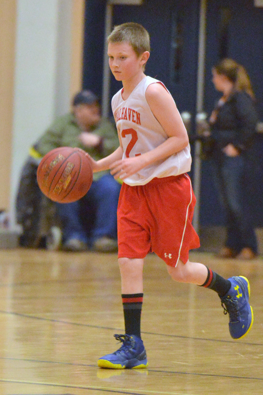 Action from the Busline small school championship between Wiscasset and Vinalhaven. After a close, hard fought battle Wiscasset was able to capture the 52-50 win. (Photo by Ron Hawkes)