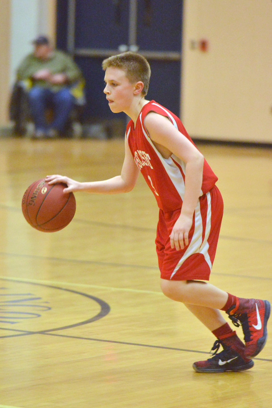 Action from the Busline small school championship between Wiscasset and Vinalhaven. After a close, hard fought battle Wiscasset was able to capture the 52-50 win. (Photo by Ron Hawkes)