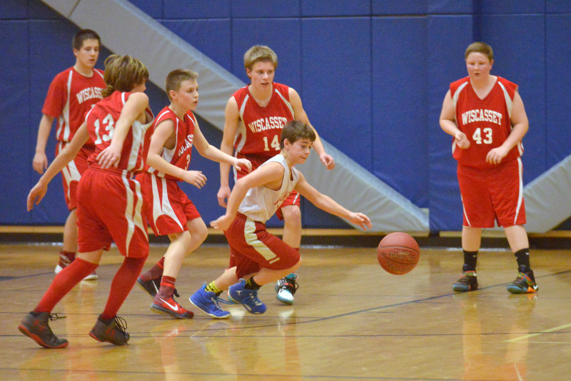 Action from the Busline small school championship between Wiscasset and Vinalhaven. After a close, hard fought battle Wiscasset was able to capture the 52-50 win. (Photo by Ron Hawkes)
