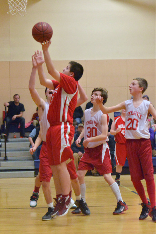 Action from the Busline small school championship between Wiscasset and Vinalhaven. After a close, hard fought battle Wiscasset was able to capture the 52-50 win. (Photo by Ron Hawkes)