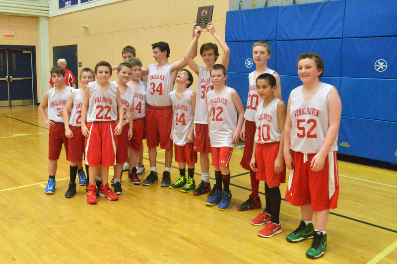 Action from the Busline small school championship between Wiscasset and Vinalhaven. After a close, hard fought battle Wiscasset was able to capture the 52-50 win. (Photo by Ron Hawkes)
