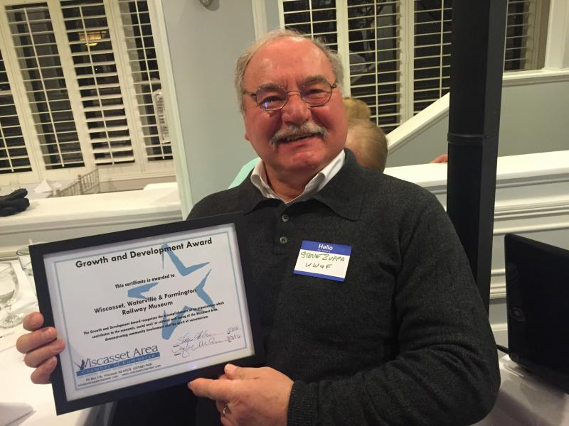 Wiscasset, Waterville & Farmington Railway Museum President Stephen Zuppa holds the award the nonprofit received at the chamber dinner. SUSAN JOHNS/Wiscasset Newspaper
