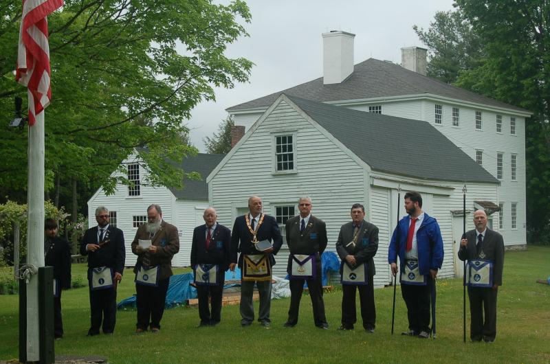 Dresden Masons stand at attention as the flag is raised in Dresden. ART MAYERS/Wiscasset Newspaper