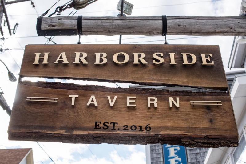 The new sign for Harborside Tavern was designed by Cody Barry and constructed by Linekin Bay Woodworkers and Nelson Metal Fabrication. Courtesy of Fiona Dunlap