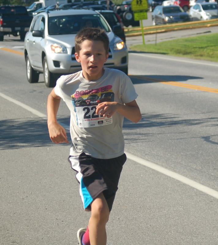 Gryffin Kristan of Boothbay Harbor placed third in the boys under 19, 5k event. ART MAYERS/Boothbay Register