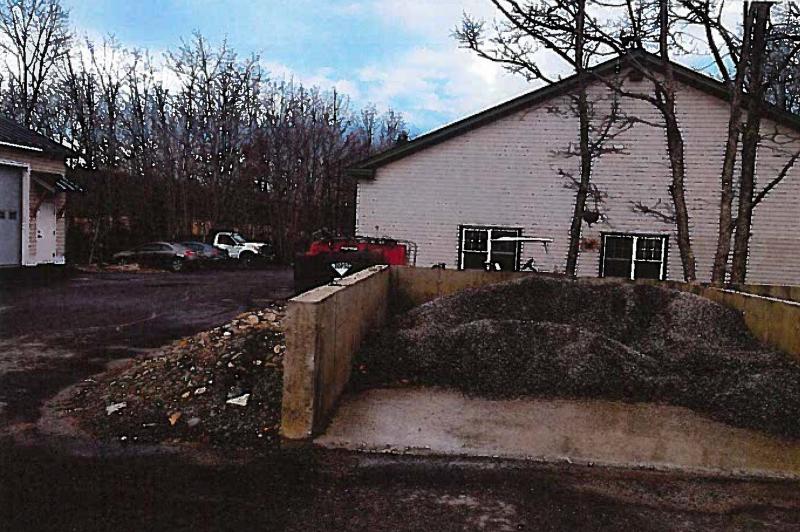 Debris and buildings encroaching on the alleged right of way, according to Attorney Lipman. Photo provided by Lipman and Katz.