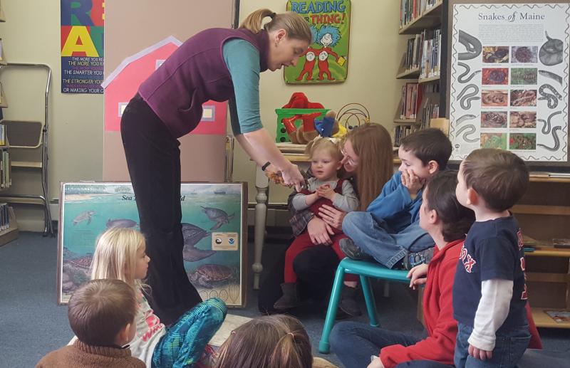 Wiscasset Public Library Children’s Room presents Chewonki’s special reptile program “Scales and Tails” to an enthusiastic crowd on Thursday, Nov. 10. Thirty children and adults enjoyed meeting live animals and learning their history from Chewonki teacher Emma Balazs. Courtesy of Molly Anderson