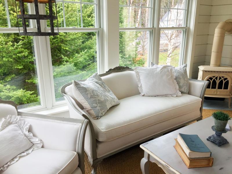 One of the sitting rooms with Suzie Groton’s grandmother’s 100-year-old couch. SUZI THAYER/Boothbay Register