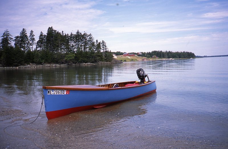 Herb Smith’s 80-year-old, canvas-covered, square stern canoe with an outboard motor. Courtesy of Herb Smith