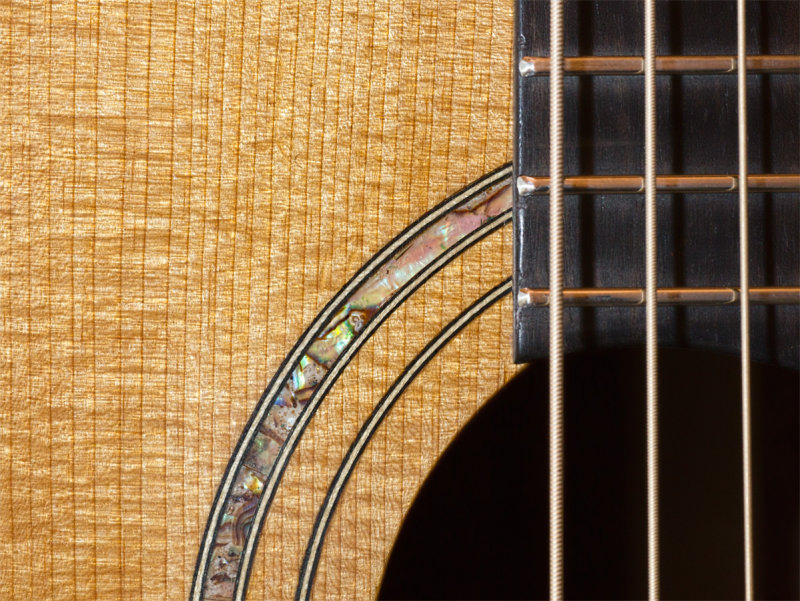 Big Wave Guitars’ torrefied Adirondack red spruce top with abalone inlay. Courtesy of Mike Gerstner Big Wave Guitars