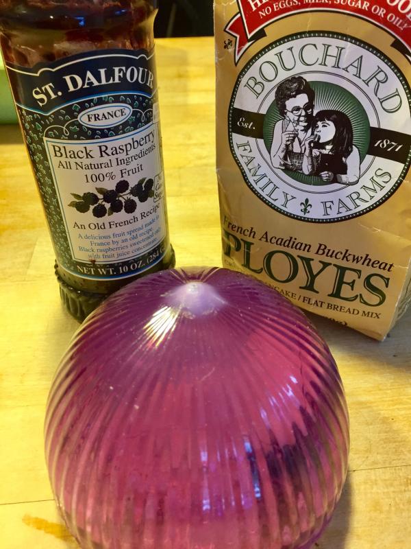 A package of ployes, French preserves, and butter. That’s in that cute purple container. I’m a cute plastic container freak. SUZI THAYER/Boothbay Register