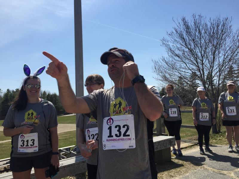 On his last day as Parks and Recreation director, Todd Souza jokes with fellow race participants Saturday before the Four-Miler. SUSAN JOHNS/Wiscasset Newspaper