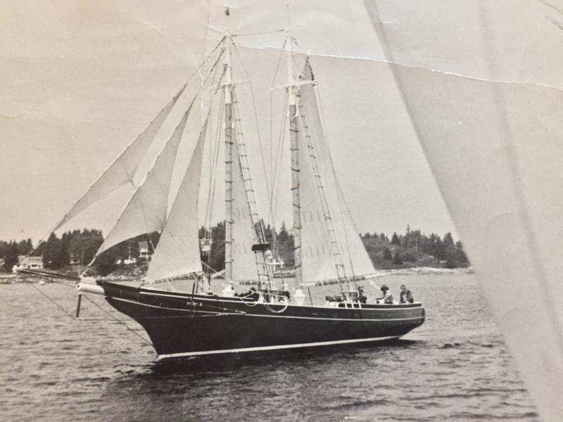 The Mary E, under full sail, heading out of Boothbay Harbor in 1972, with Captain Stan Parks at the helm. Courtesy of Stephen Rubicam