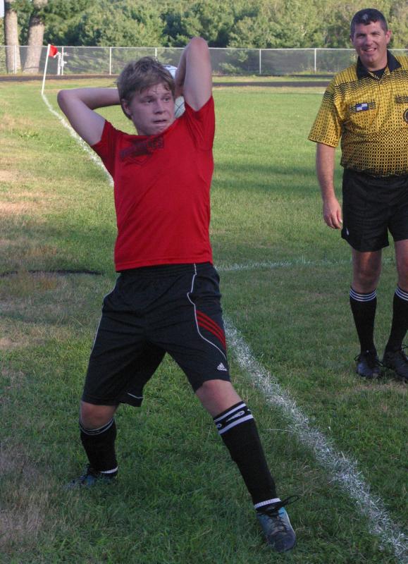 Josh Jones takes a throw-in during pre-season action for Wolverines soccer. PHIL DI VECE/Wiscasset Newspaper