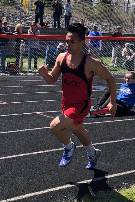 Chris Loyola runs the 4 by 200 relay race at BIRC Saturday. Courtesy of Josiah Winchenbach