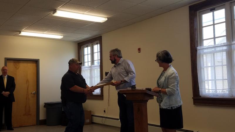 Dresden Fire Chief Lilly, left, accepts the “Spirit of America” award from State Rep. Jeff Pierce. KATRINA RICKERMANN/Wiscasset Newspaper
