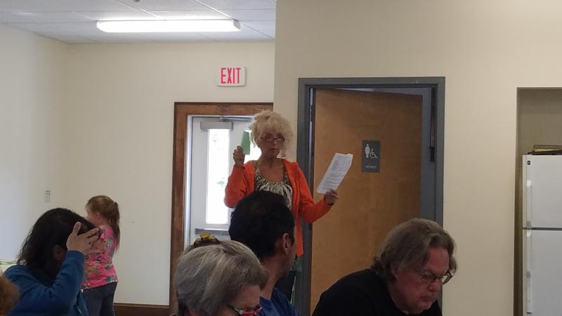 Heather Beasley, local resident and business owner, asks how the numbers for sand costs were estimated. KATRINA RICKERMANN/Wiscasset Newspaper