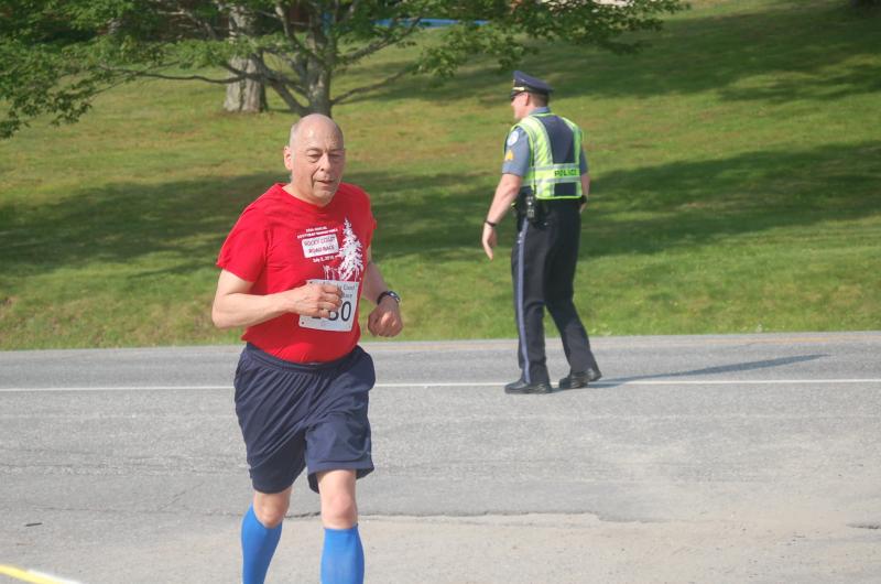 Fred Nehring finishes the 5k race. ART MAYERS/Boothbay Register