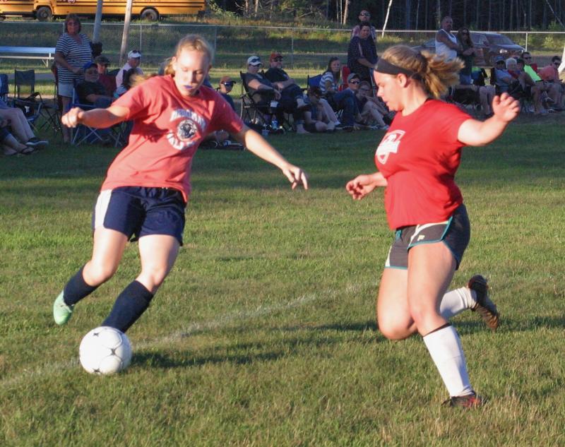 Ellie Pratt, right, is among the Wolverine veterans playing summer soccer. PHIL DI VECE/Wiscasset Newspaper