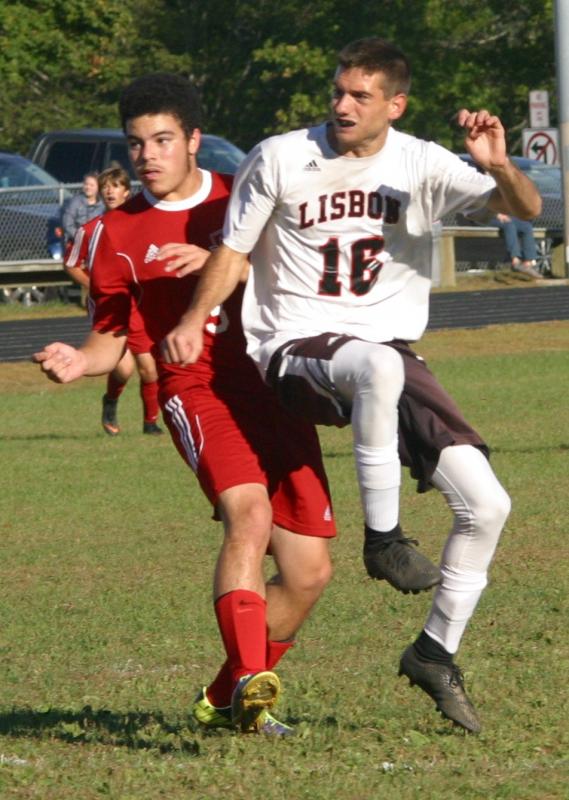 Wiscasset/Boothbay’s Bayly Gaughan-Carrasco and Lisbon’s Cameron Poisson. PHIL DI VECE/Wiscasset Newspaper