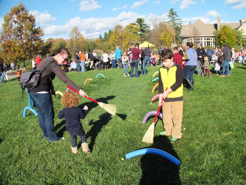 Players in the Apple Broom Race - croquet with apples and brooms! LISA KRISTOFF/Boothbay Register Coastal Maine Botanical Gardens