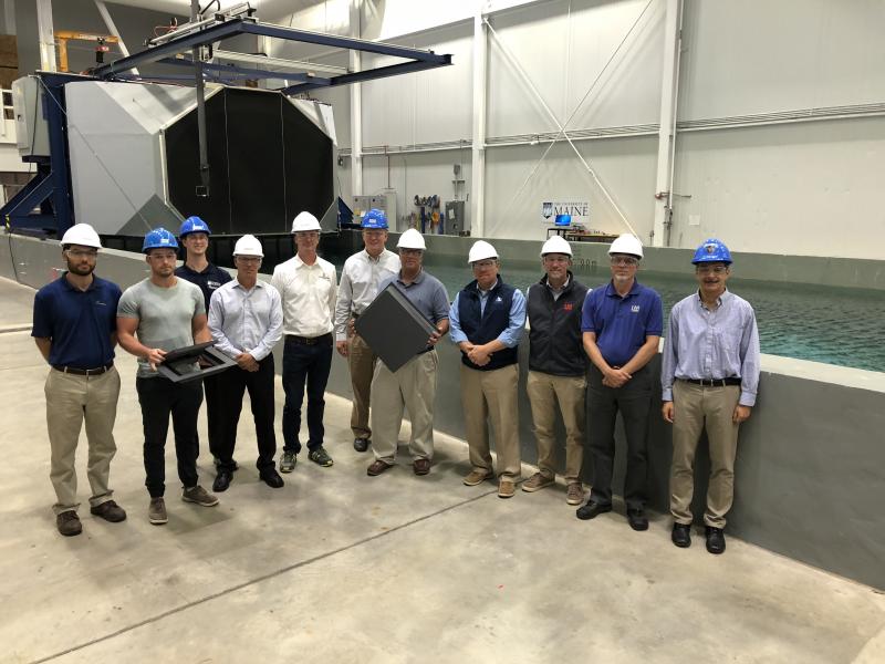 Maine boatbuilders visit the University of Maine Advanced Structures and Composites Center to kick off the formation of a consortium focused on providing 3D printing technology to the boatbuilding industry. From left are Chris Moran of Compounding Solutions; Kohl Shaw of the Advanced Structures and Composites Center; Camerin Seigars of the UMaine Composites Center; Joe Wilson of Compounding Solutions; Nate Thompson of Hodgdon Yachts; James Anderson, UMaine Composites Center senior program manager; Burr Shaw of The Hinckley Company; Kevin Burns of Back Cove/Sabre Yachts; Josh Moore of Lyman-Morse Boatbuilding; Kevin Houghton of Lyman-Morse Boatbuilding; and Habib Dagher, UMaine Composites Center executive director. Photo courtesy of the Advanced Structures and Composites Center