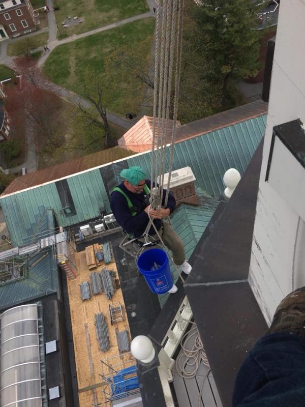 Mid-Maine Restoration’s work on clock towers, church steeples and the like requires crew members to toil at great heights. Courtesy of Mid-Maine Restoration colby college, mid-maine restoration