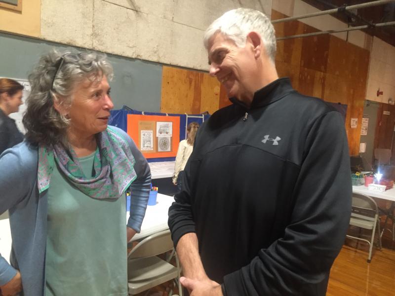 Art teacher Donna Barnes and athletic director Warren Cossette talk before the start of the Oct. 17 event. SUSAN JOHNS/Wiscasset Newspaper