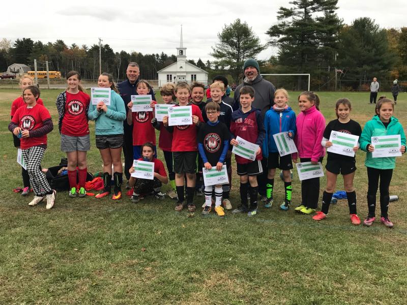 Fire and Dynamo teams from Wiscasset Recreation complete a successful recreation soccer season against Richmond, Boothbay and Damariscotta teams: Coach Glenn Powers, Aidan Cary, Jessie Willey, Mya Marshall, Margaret Sawyer, Nestor Powers, Peter Rego, Olivia Marshall, Coach Shanon Cotta, Aidan Sanborn, Anna Gosselin, Brooke Lincoln, Emerson Blagdon, Garrett Marshall, Gavin Keane, Justine Marshall, Madelynne Richardson and Owen Cotta. Courtesy photo