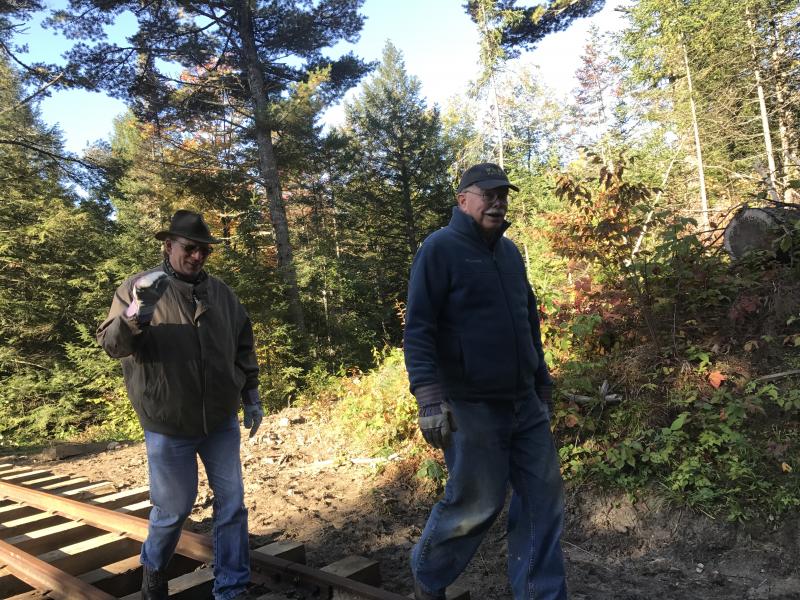 Massachusetts' Pete Barrington, left, and New Hampshire's Kenneth Steeves take part in the fall work weekend. SUSAN JOHNS/Wiscasset Newspaper