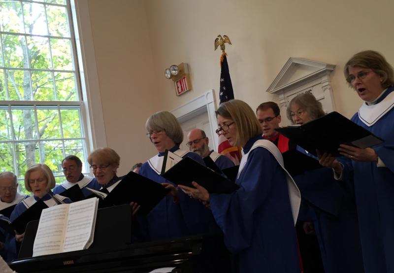 The choir and pastor Josh Fitterling, back, third from right, sing “"Lord, make me an instrument of peace.” Fitterling said it was chosen in advance to honor the organizations getting Summerfest funds because their work represents hope and impacts the community, but he said it was also fitting “in the face of the awful hate crime” Oct. 27 in a Pennsylvania synagogue. SUSAN JOHNS/Wiscasset Newspaper