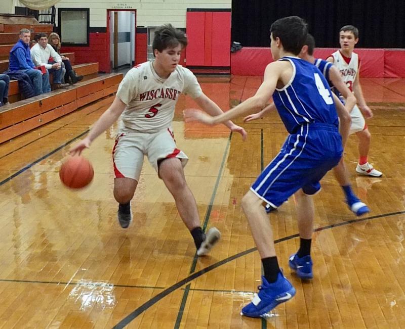 Billy Pinkham brings the ball down the court. PHIL DI VECE/Wiscasset Newspaper