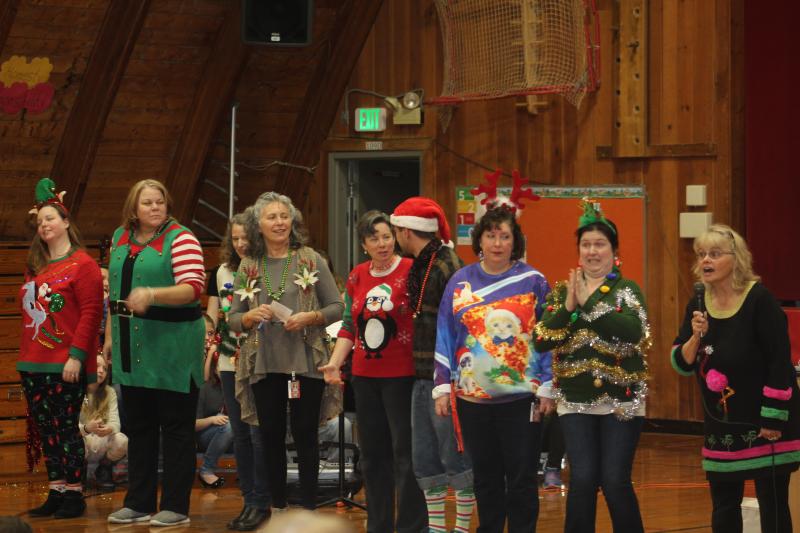 Staff members join Carole Drury for an ugly sweater contest. VANESSA DUNN/Wiscasset Newspaper