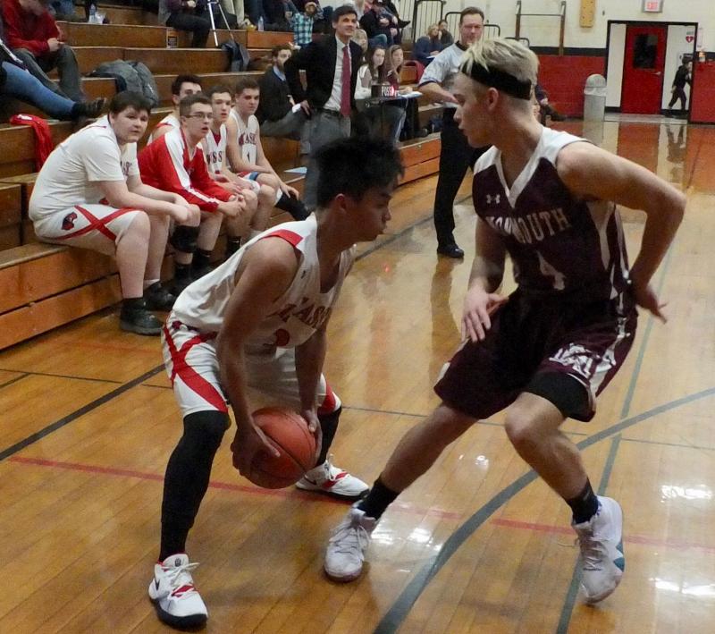 Chris Loyola takes on Monmouth’s Dylan Lajoie. PHIL DI VECE/Wiscasset Newspaper