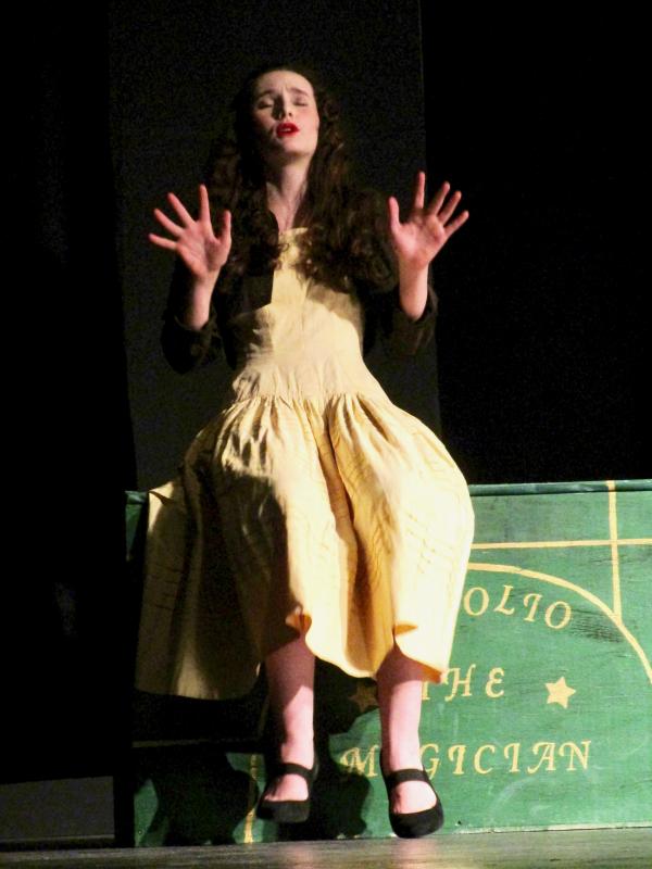 Naomi Wood, playing Vera, sits on the mysterious magician’s box. PHIL DI VECE/Wiscasset Newspaper