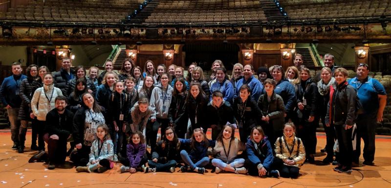 Y-Arts travelers on stage at the New Amsterdam Theater where Aladdin on Broadway is currently playing. Courtesy of Emily Mirabile