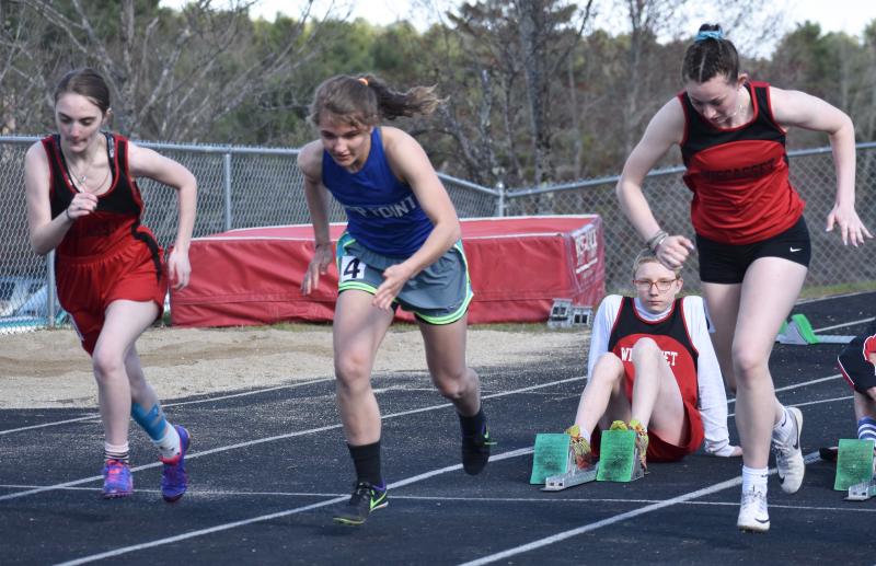 Gwenn Webber, right, won the 100-meter dash, Josie Harrington, center, was fourth and Lily Cooper, left, placed sixth. PHIL DI VECE/Wiscasset Newspaper