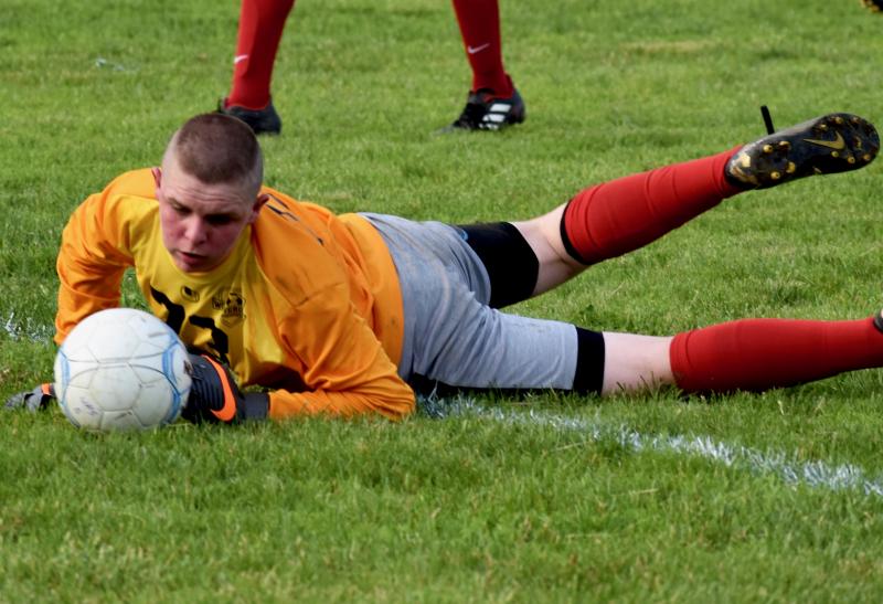 L.J. Travers hits the turf making a save for Wiscasset in the opening game of the summer soccer season played against Gardiner June 18 at WMHS. PHIL DI VECE/Wiscasset Newspaper
