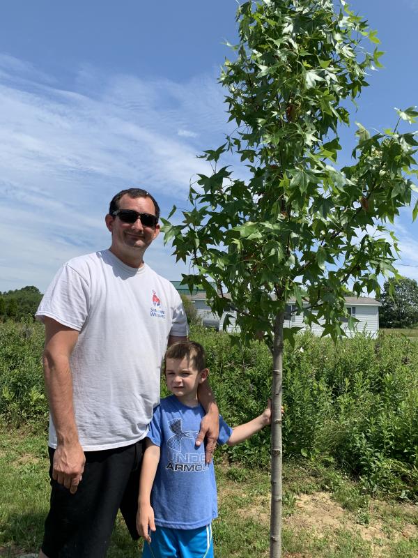 Alna’s Tom McKenzie and son Toby, 5, visit the gardens. SUSAN JOHNS/Wiscasset Newspaper