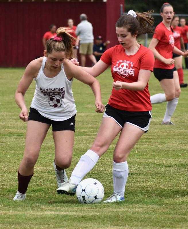 Paige Davenport takes on a Richmond player. PHIL DI VECE/Wiscasset Newspaper