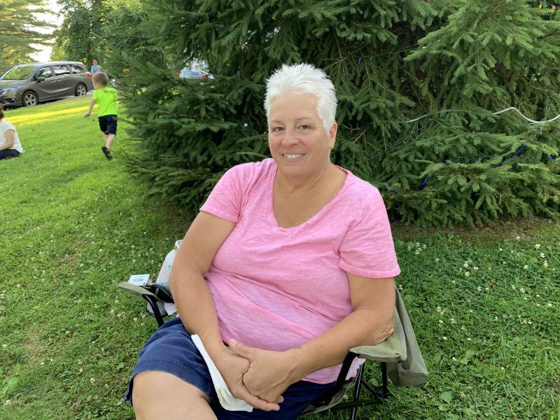 Jenn Spaur takes in the concert on a nice Wiscasset night Aug. 1. SUSAN JOHNS/Wiscasset Newspaper