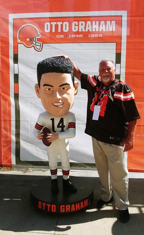 Duey Graham with a huge bobblehead of his father, Otto Graham. Courtesy photo