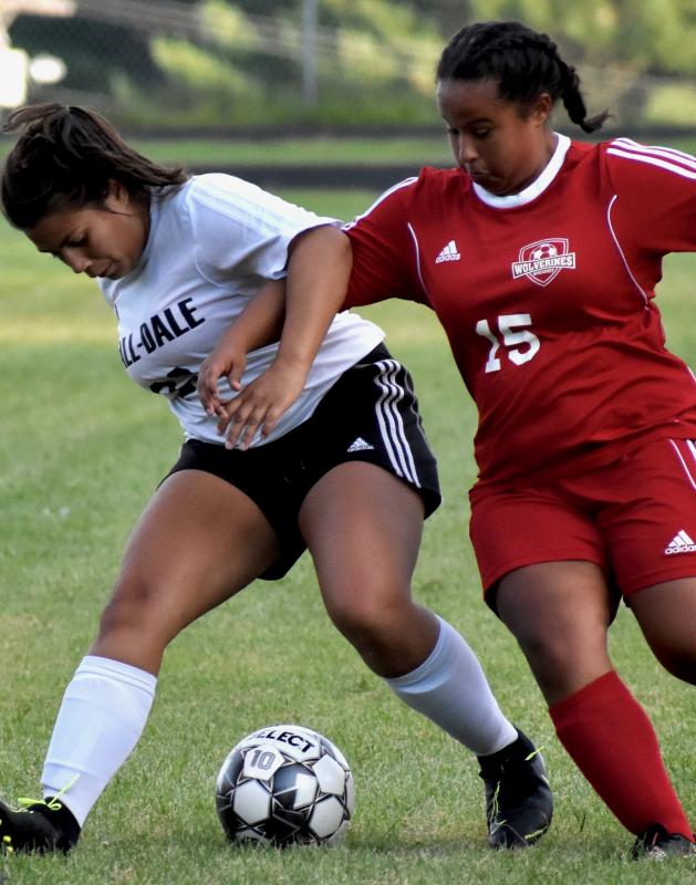 Latisha Wright takes on a Hall-Dale player. PHIL DI VECE/Wiscasset Newspaper