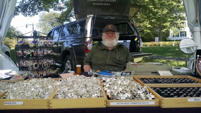 Terry Strickland of Karrottop Jewelry has been coming to the Arts & Crafts Shows on the Boothbay Common for nearly 20 years. MARGARET HOFFMAN/Boothbay Register Terry Strickland, Karrottop Jewelry